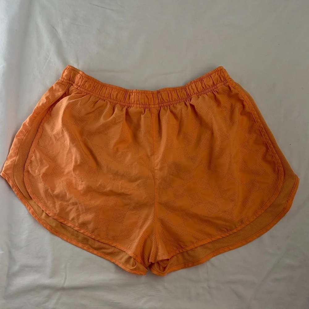 Nike Women's Vibrant Orange Athletic Shorts